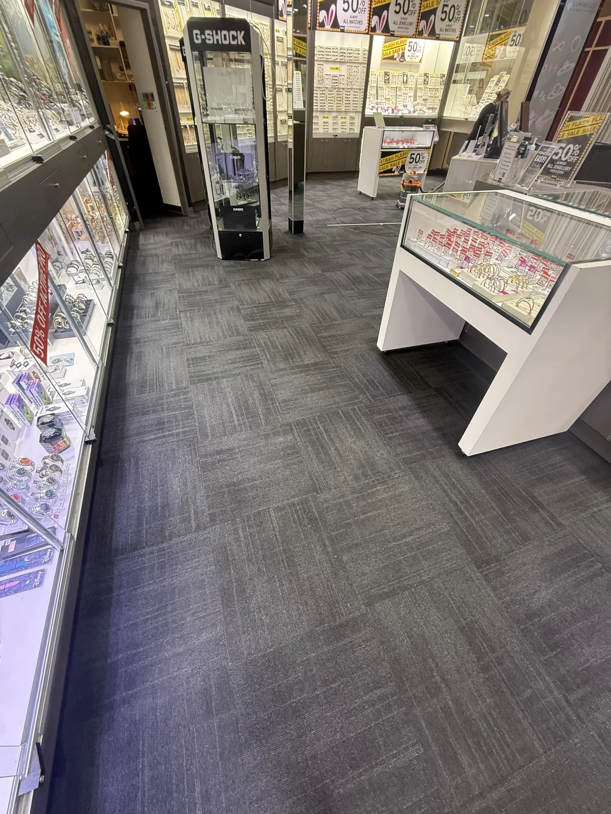 Carpet tile installation in jewellery store